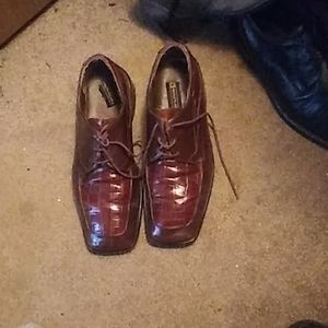 Three pair of shoes two pair of Stacy Adams brown